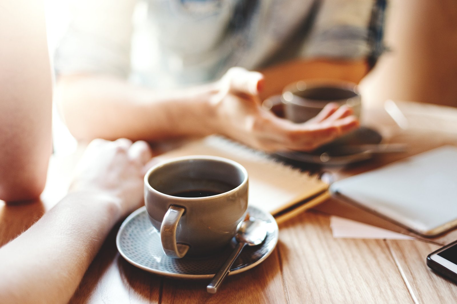 Professionals meeting over coffee